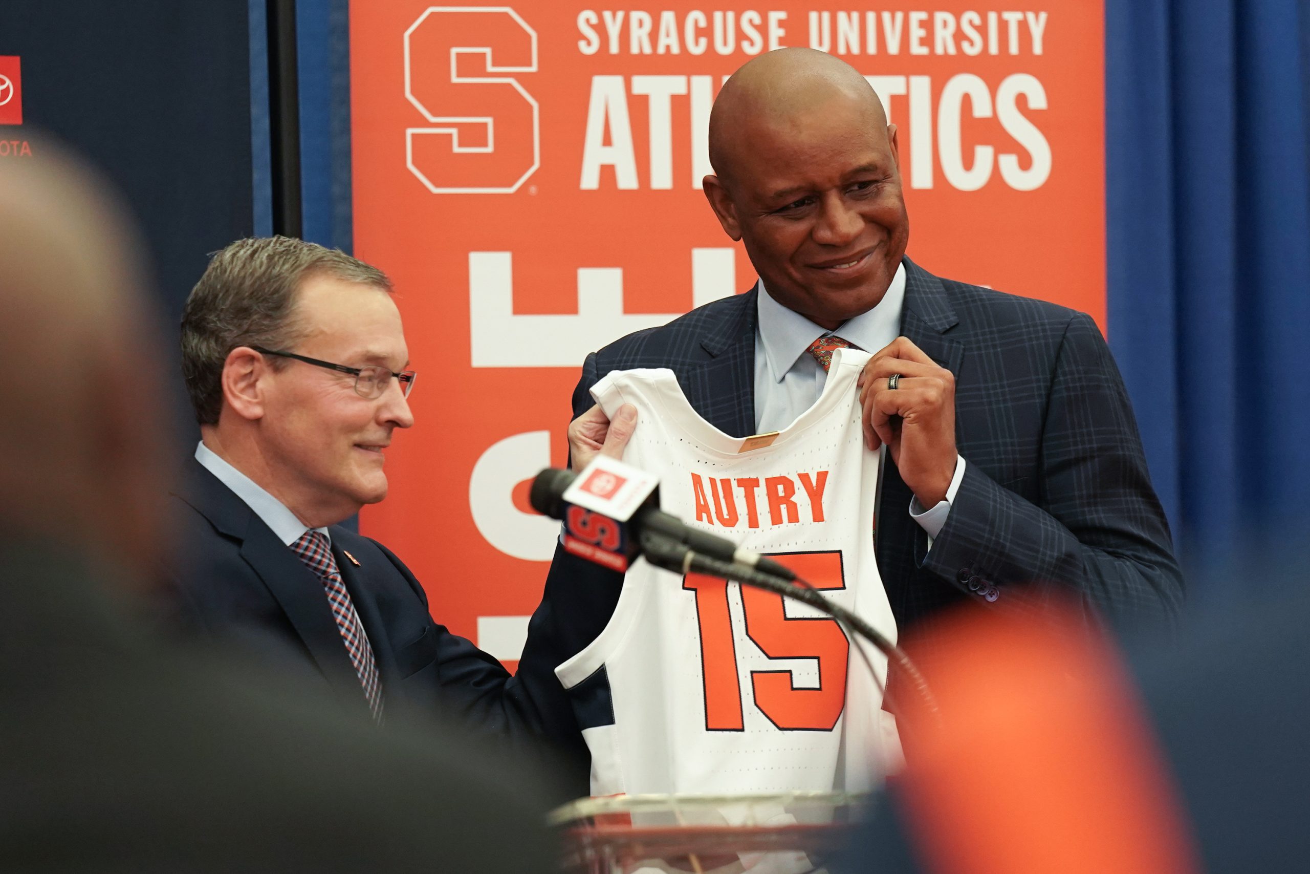 Syracuse Head Coach Adrian Autry holds up his jersey during a press conference on Friday, March 10, 2023 in the Carmelo K. Anthony Basketball Center. Photo by Joseph Martino.