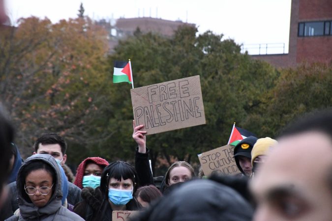 SU students carry signs and Palestinian flags at the protest on Thursday November 9.