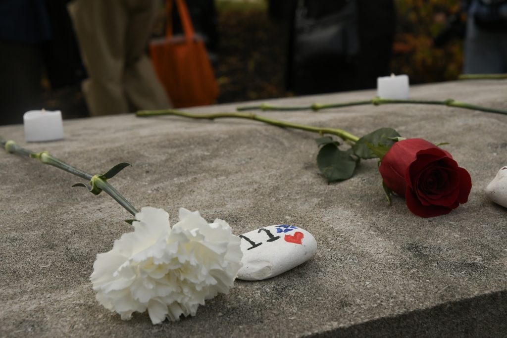 A rose and stone layed at the Rememberance Week Rose-Laying Ceremony on Friday, October, 20, to honor the 11 residents of Lockerbie, Scotland that were killed as a result of the bombing of Pan Am flight 103. (Photo by Danny Amron)