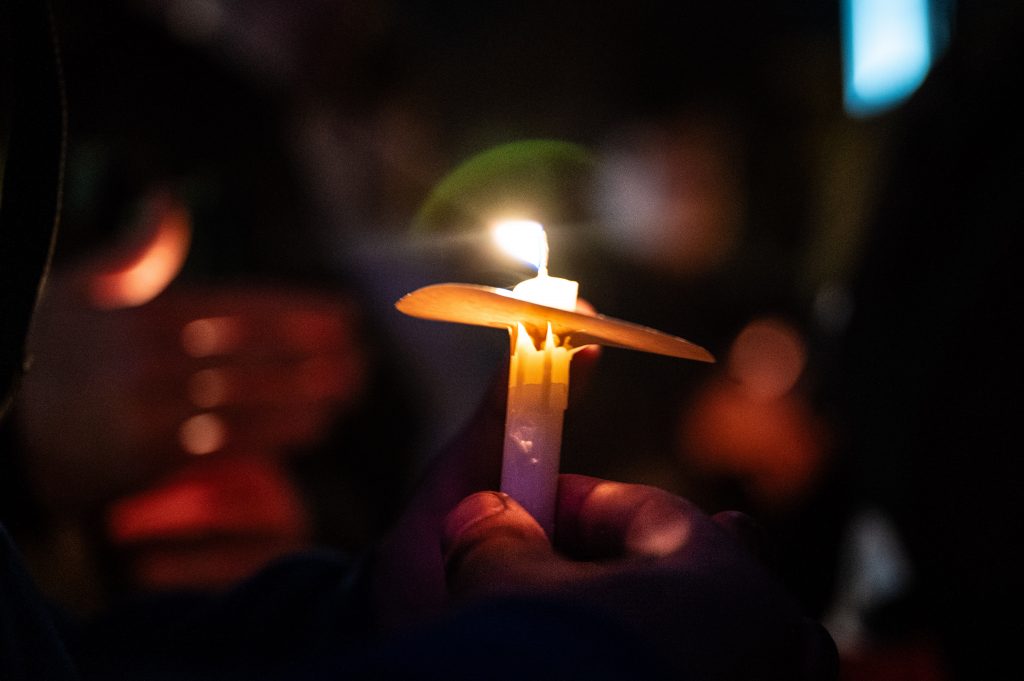 Members of the Phi Kappa Psi faternity and the Kappa Kappa Gamma sorority participate in a candle light vigil for Hunter Watson and Vincent Marguerie on Hendricks Chapel at Syracuse University, Monday, 16 Oct, 2023.
