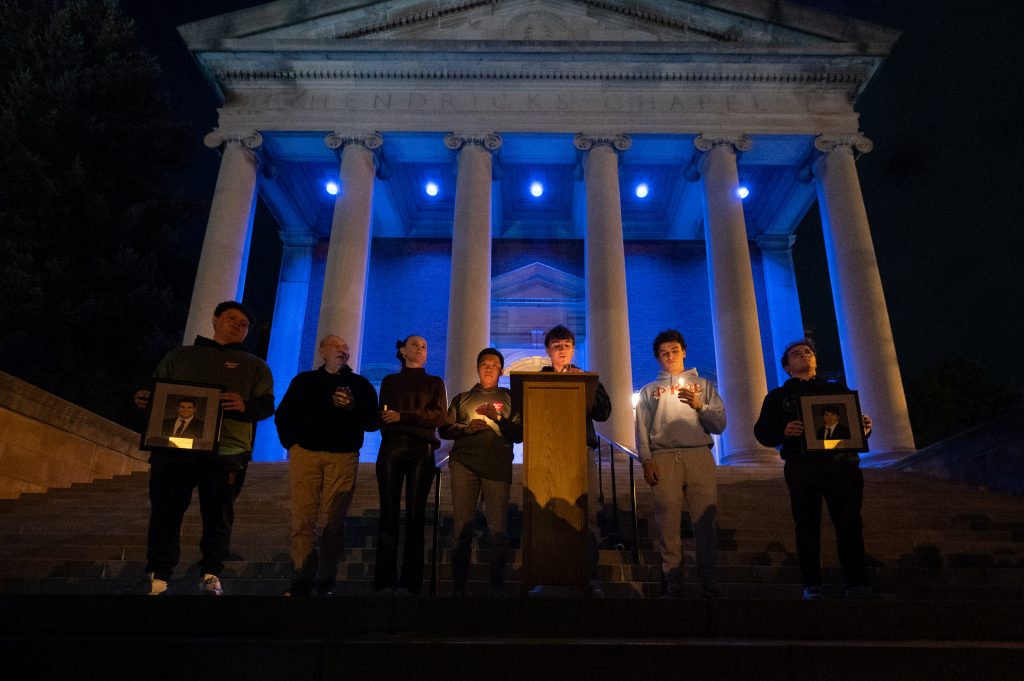 Members of the Phi Kappa Psi fraternity speak at a candlelight vigil for Hunter Watson and Vincent Marguerie on Hendricks Chapel at Syracuse University, Monday, 16 Oct, 2023. (NewsHouse/Photo Theoplis Stewart II)