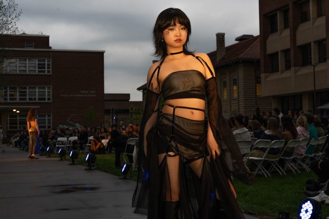 Rui Guo models designer Cici Modin's garment on the FADS runway.