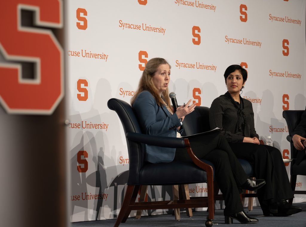 SU Associate Provost for Faculty Affairs Jamie Winders (left) chats with Rumman Chowdhury, CEO of Humane Intelligence, visits Syracuse University to conduct a lecture about Generative AI and the future of humanity on 6 March, 2024 in Goldstein Auditorium.