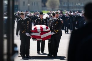 First responders carry the casket of Onondaga County Sheriff Lt. Michael A. Hoosock Funeral at the New York State Fairgrounds Exposition Center, April 22, 2024. Hoosock was killed on duty on April 14, 2024.