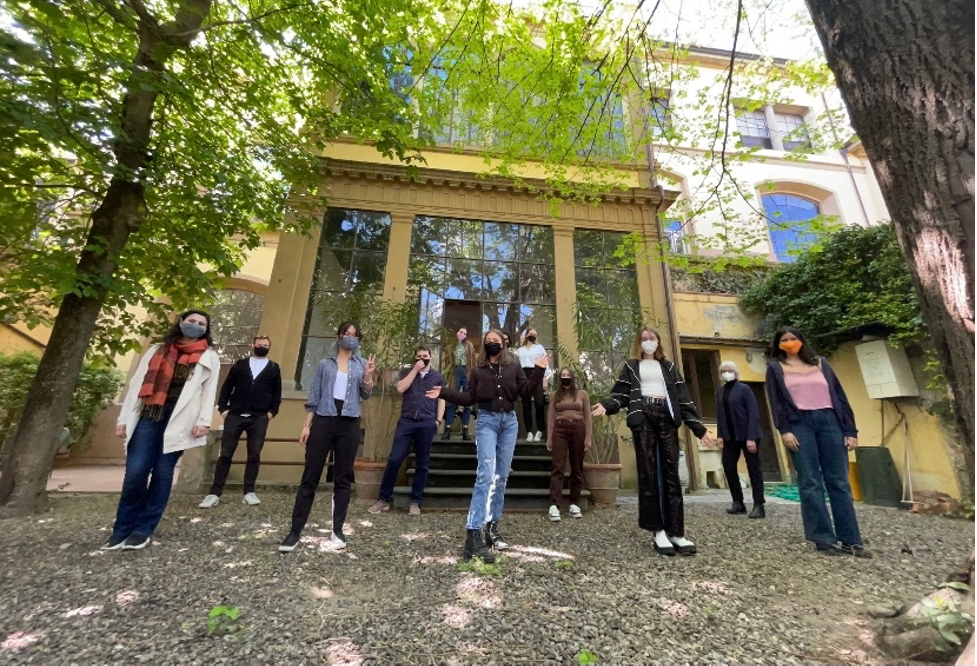 SU architecture students studying abroad in Florence, Italy, stand in the School of Architecture Garden.