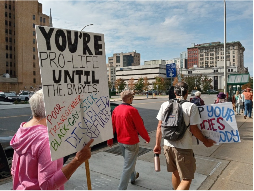 Pro-choice advocates march through Syracuse on Saturday, October 2.