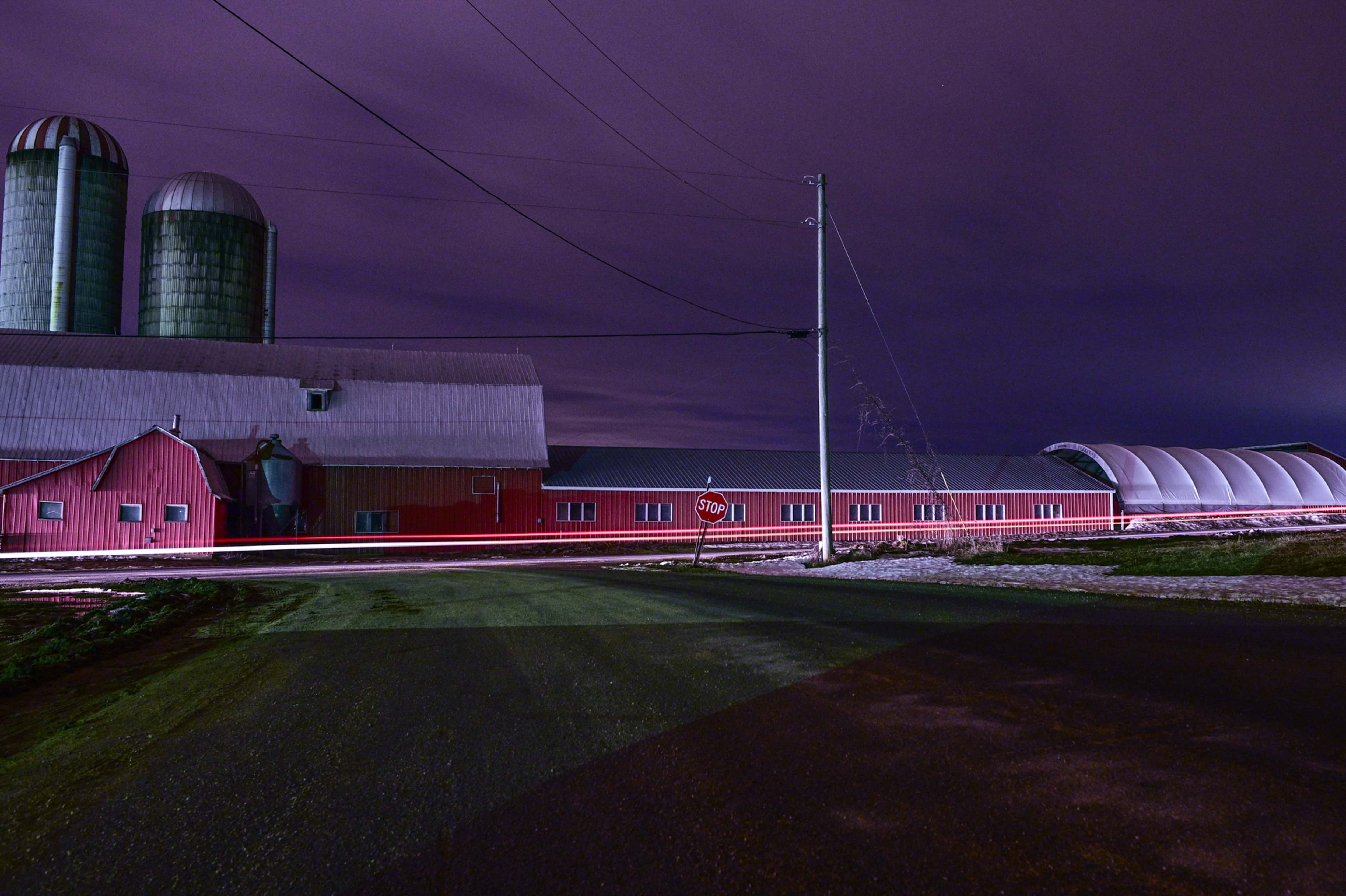 Facing south on Roxham Road at night towards North Star Road