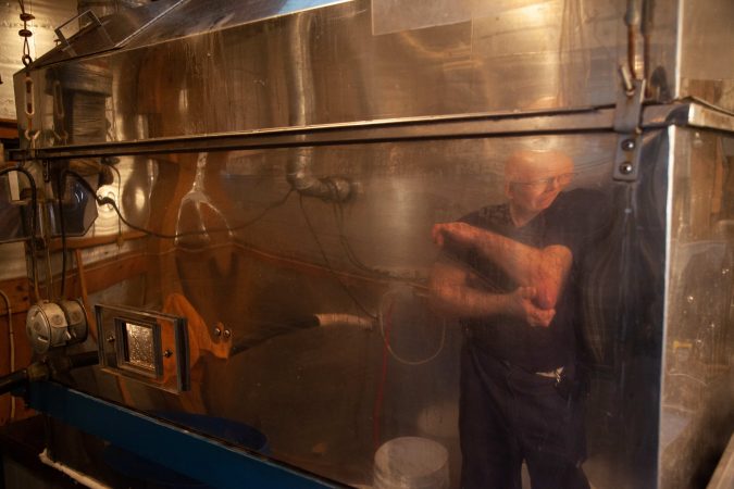 Hugh Newton in his sugarshack in Potsdam, New York.