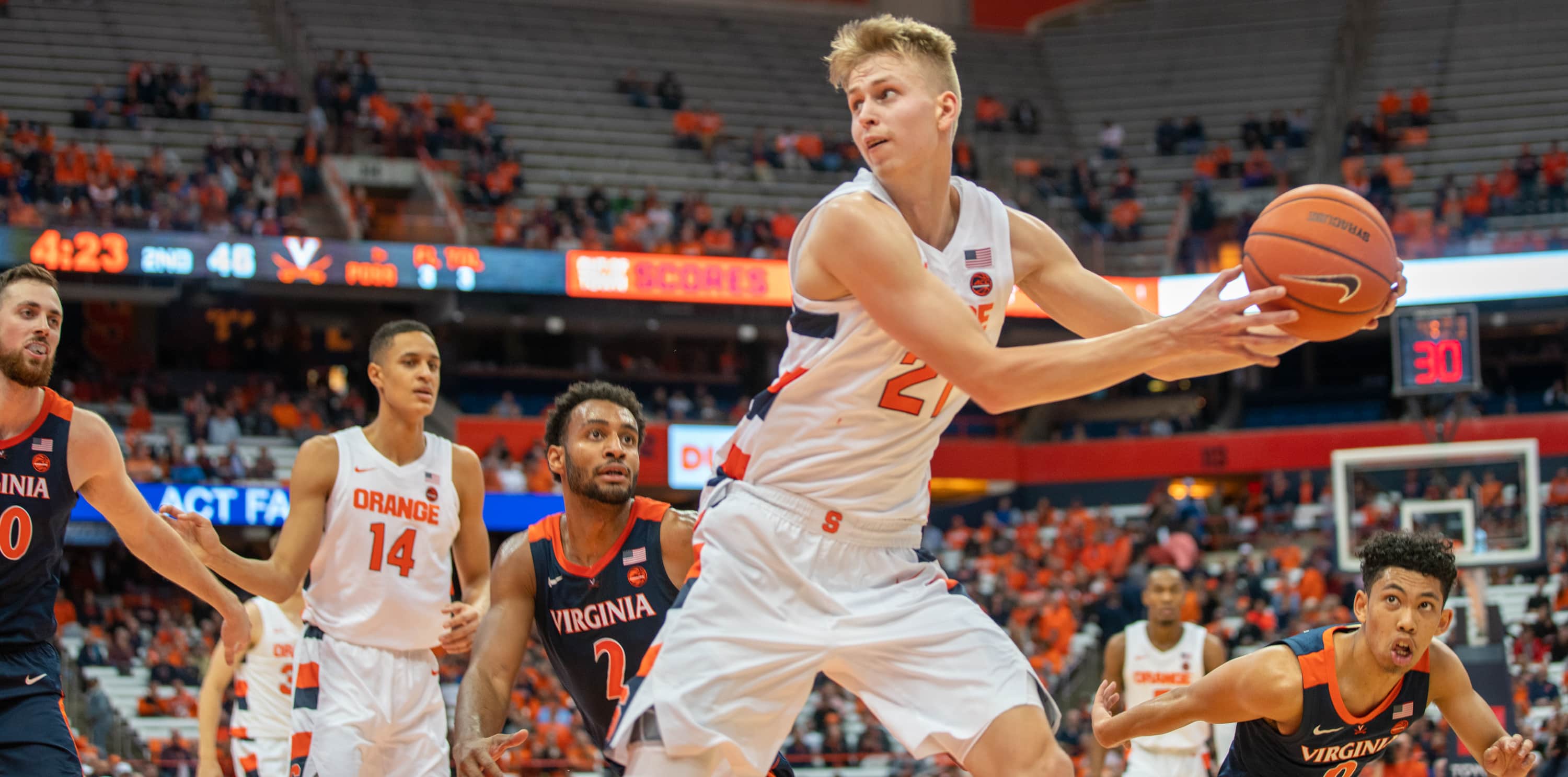 Marek Dolezaj under pressure during SU's loss to Virginia on Nov. 6, 2019.