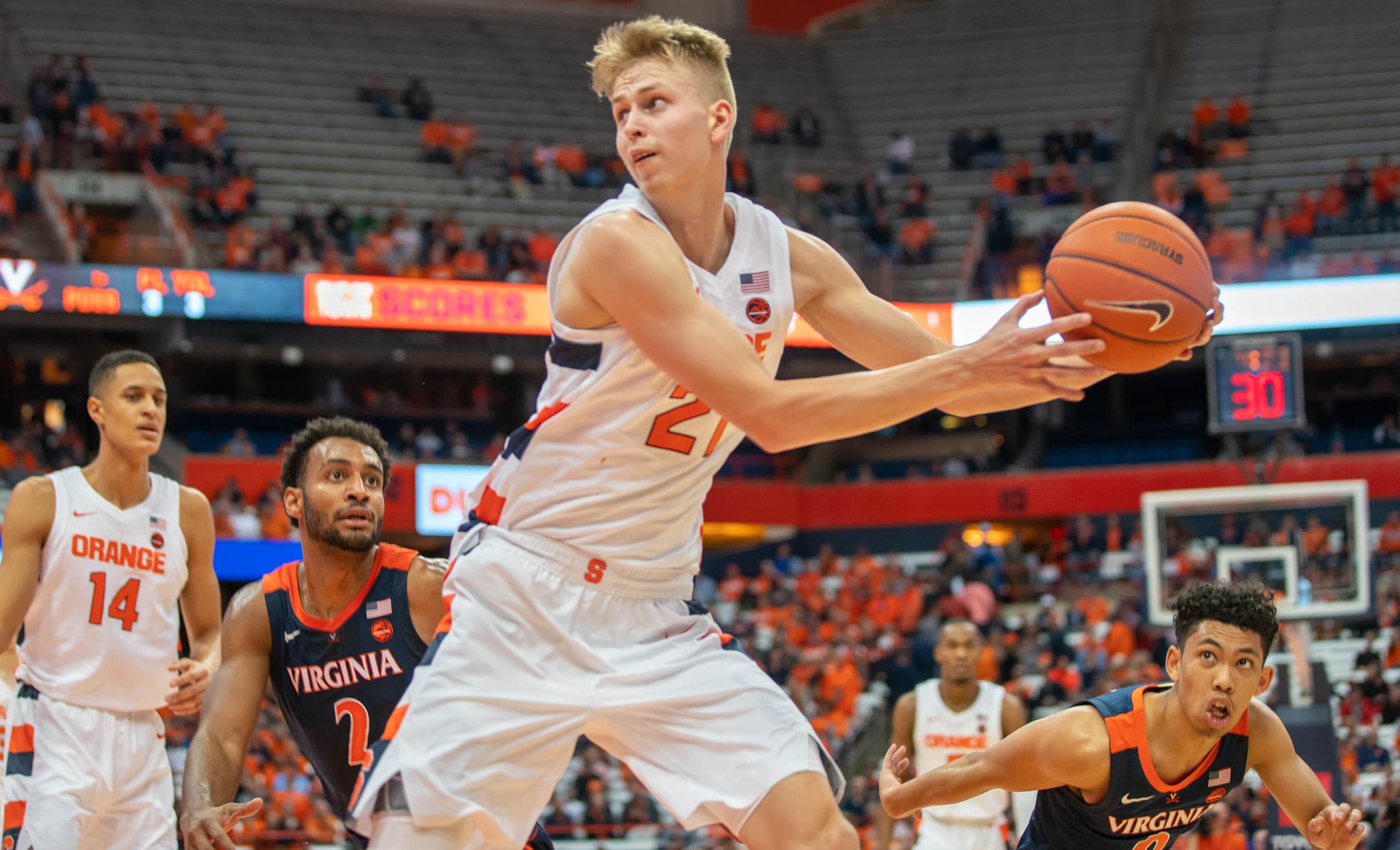 Marek Dolezaj under pressure during SU's loss to Virginia on Nov. 6, 2019.