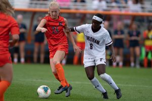 Meghan Root (24) and Danielle Etienne (8) fight for the ball during the game at the SU Soccer Stadium on Sept.15, 2019.