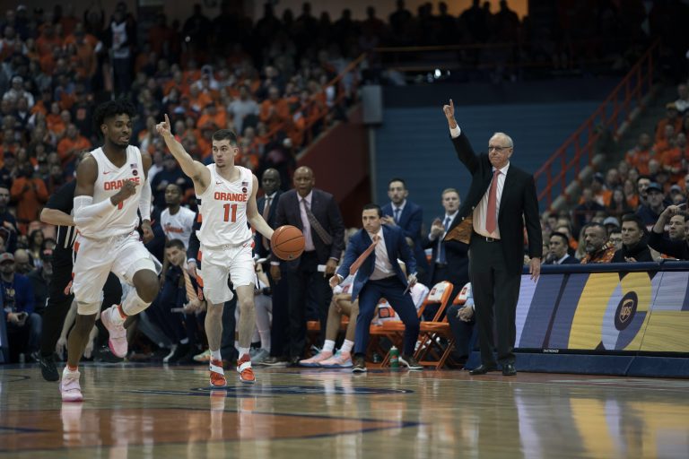 Syracuse's Joe Girard III and Qunicy Guerrier make their way down the court.