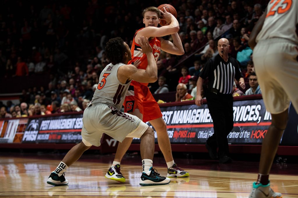 Syracuse's Buddy Boeheim fends off Wabissa Bede of Virginia Tech on Jan. 18 in Blacksburg, Va.