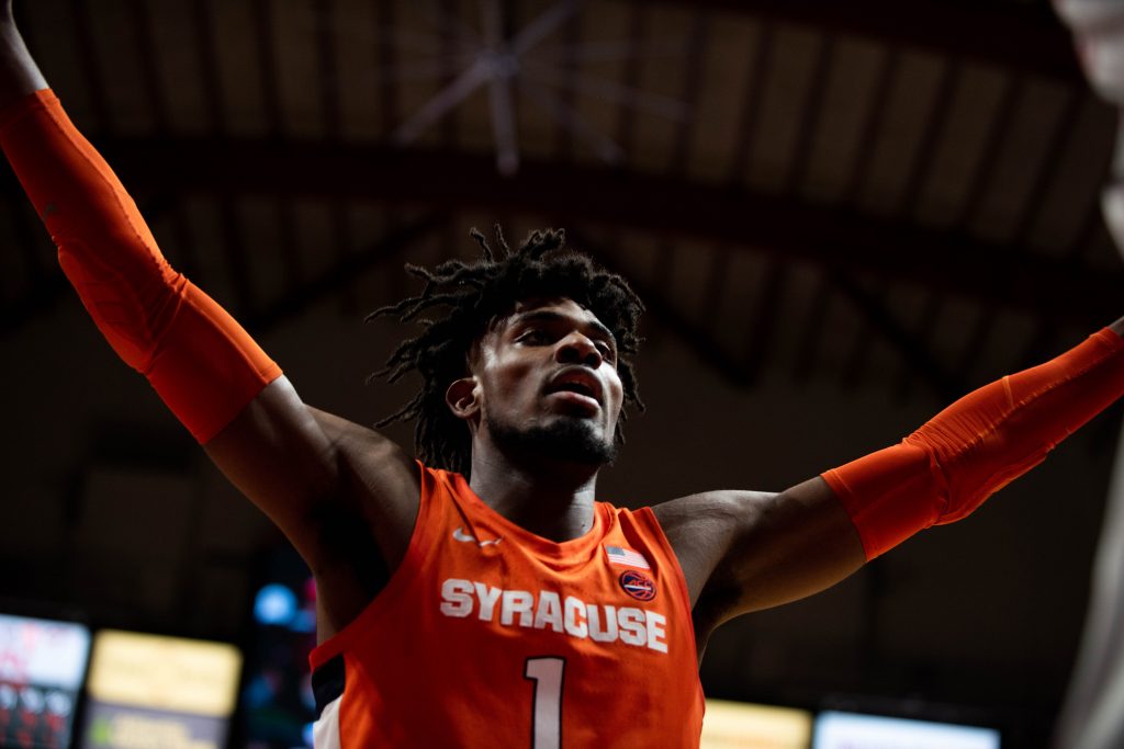 Syracuse's Quincy Guerrier (1) puts his arms out to defend against the Hokies on Jan. 18, 2020 in Blacksburg, Va.