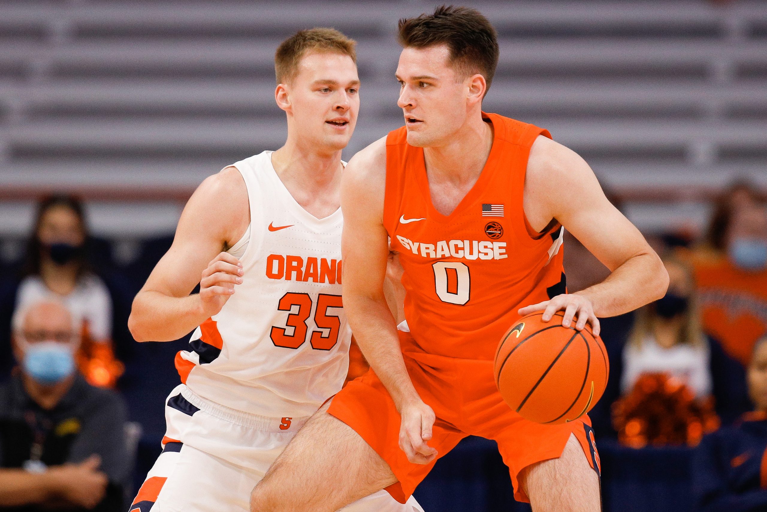 Buddy Boehim guards Jimmy Boehim III during the Orange Tip-Off scrimmage at the Dome on October 22, 2021.