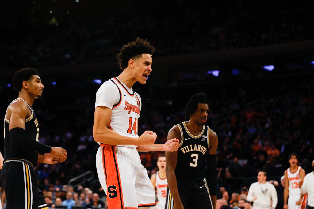 Syracuse's Jesse Edwards reacts after a dunk during the Jimmy V Classic at Madison Square Garden on December 7, 2021. Syracuse Men's Basketball in action against Villanova during the Jimmy V Classic at Madison Square Garden on December 7, 2021