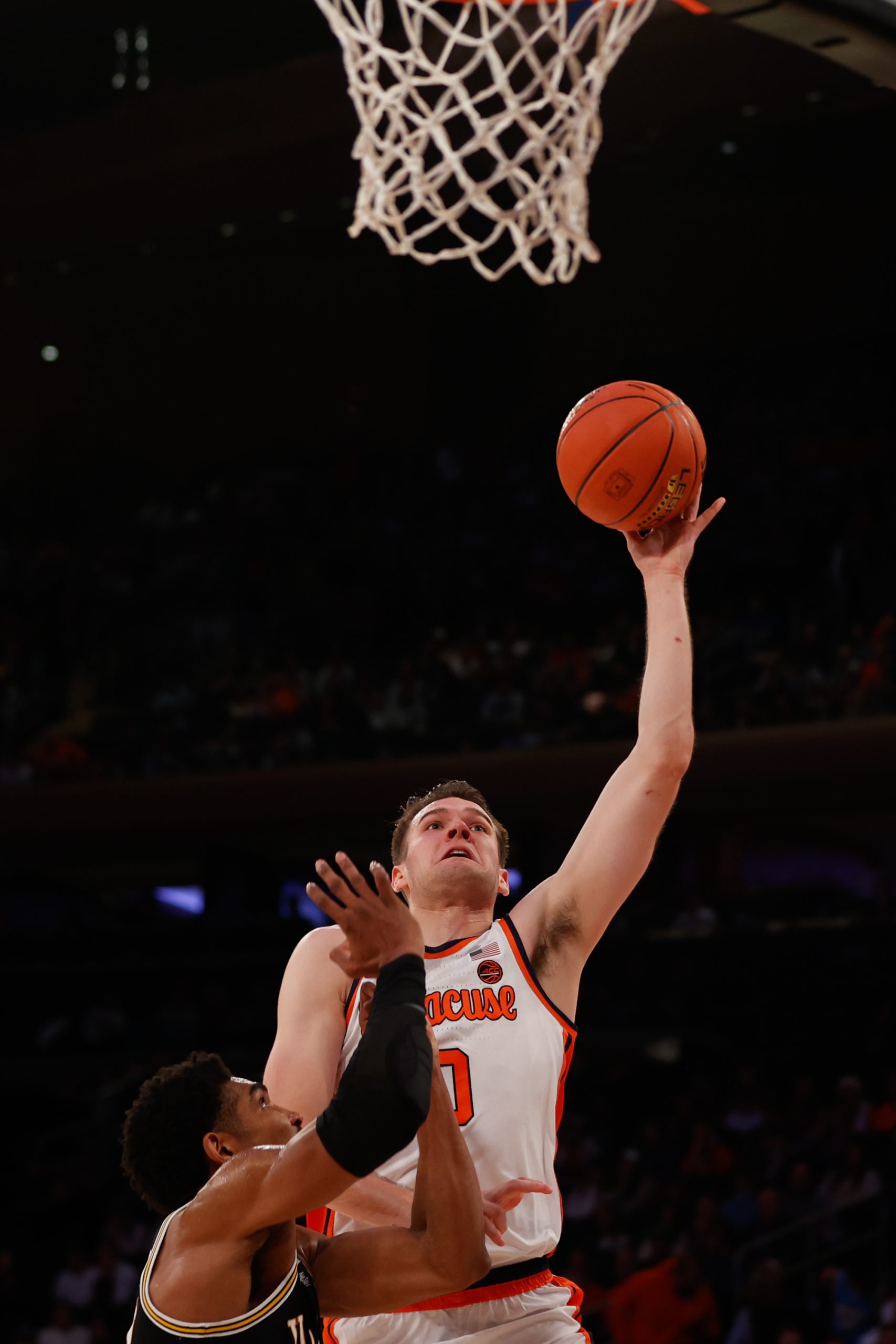 Jimmy Boeheim III attempts a shot over a Villanova defender during the Jimmy V Classic at Madison Square Garden on December 7, 2021. Syracuse Men's Basketball in action against Villanova during the Jimmy V Classic at Madison Square Garden on December 7, 2021