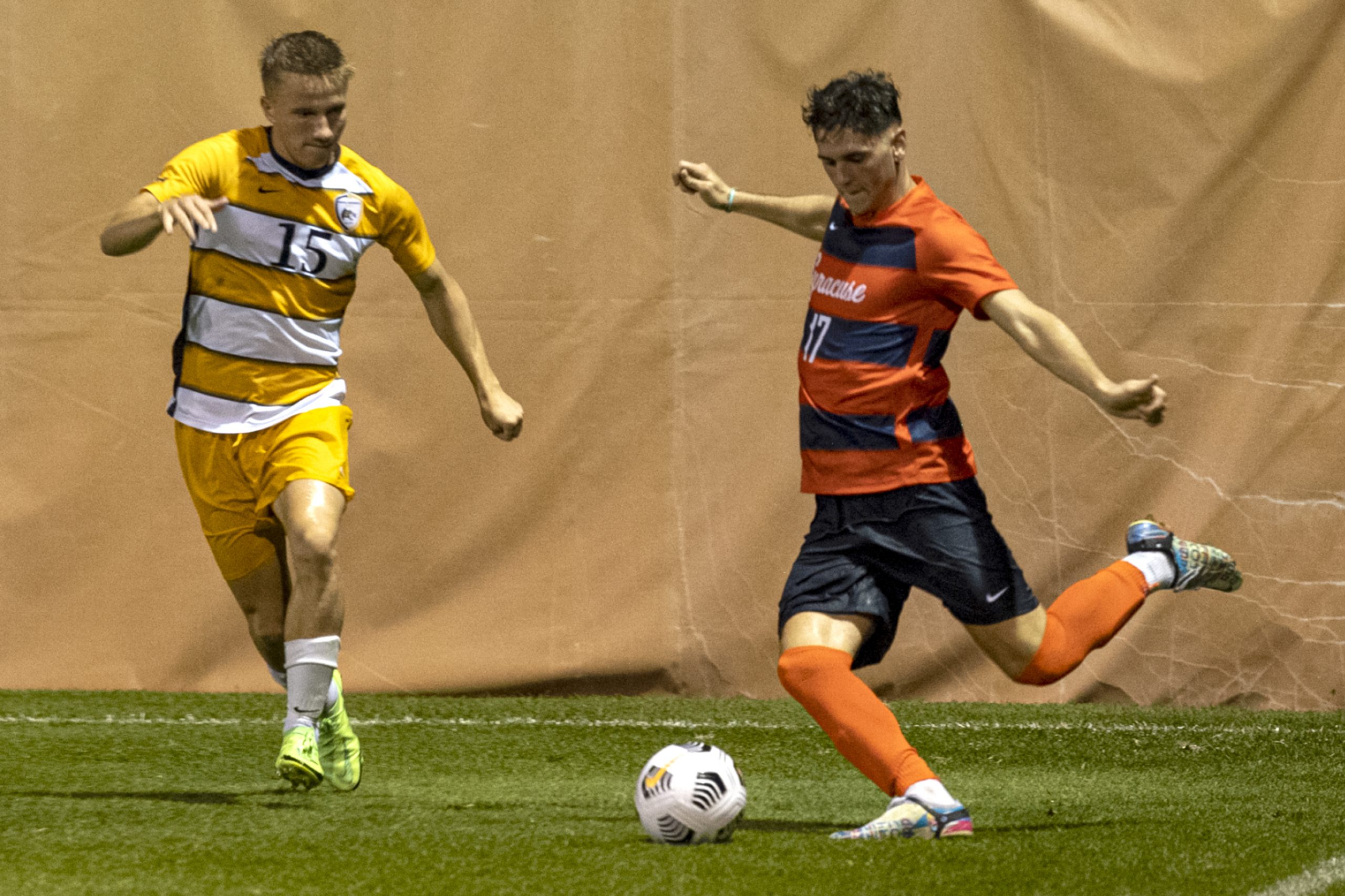 Graduate midfielder Luke Biasi attempts to cross the ball during the Syracuse men's soccer season opener against Drexel at the SU Soccer Stadium, August 26.