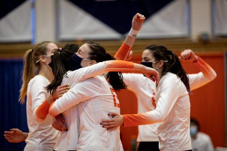 SU's Yuliia Yastrub (13) embraces her teammates during the March 5, 2021 game against UNC in the Women's Building in Syracuse, NY.
