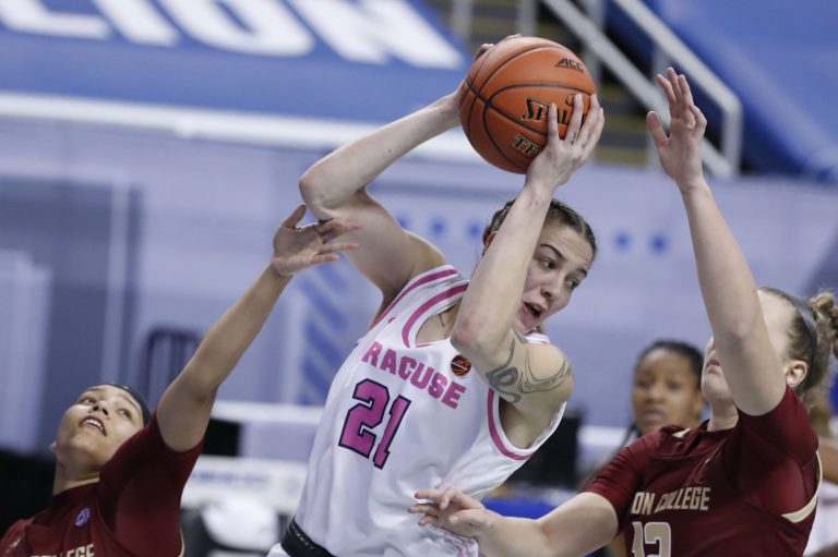 Syracuse forward Emily Engstler (21) grabs a rebound