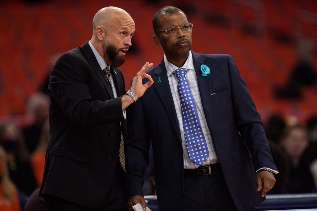 Syracuse coaches Vonn Read and John Marcum discuss tactics during the upset on Wednesday night.