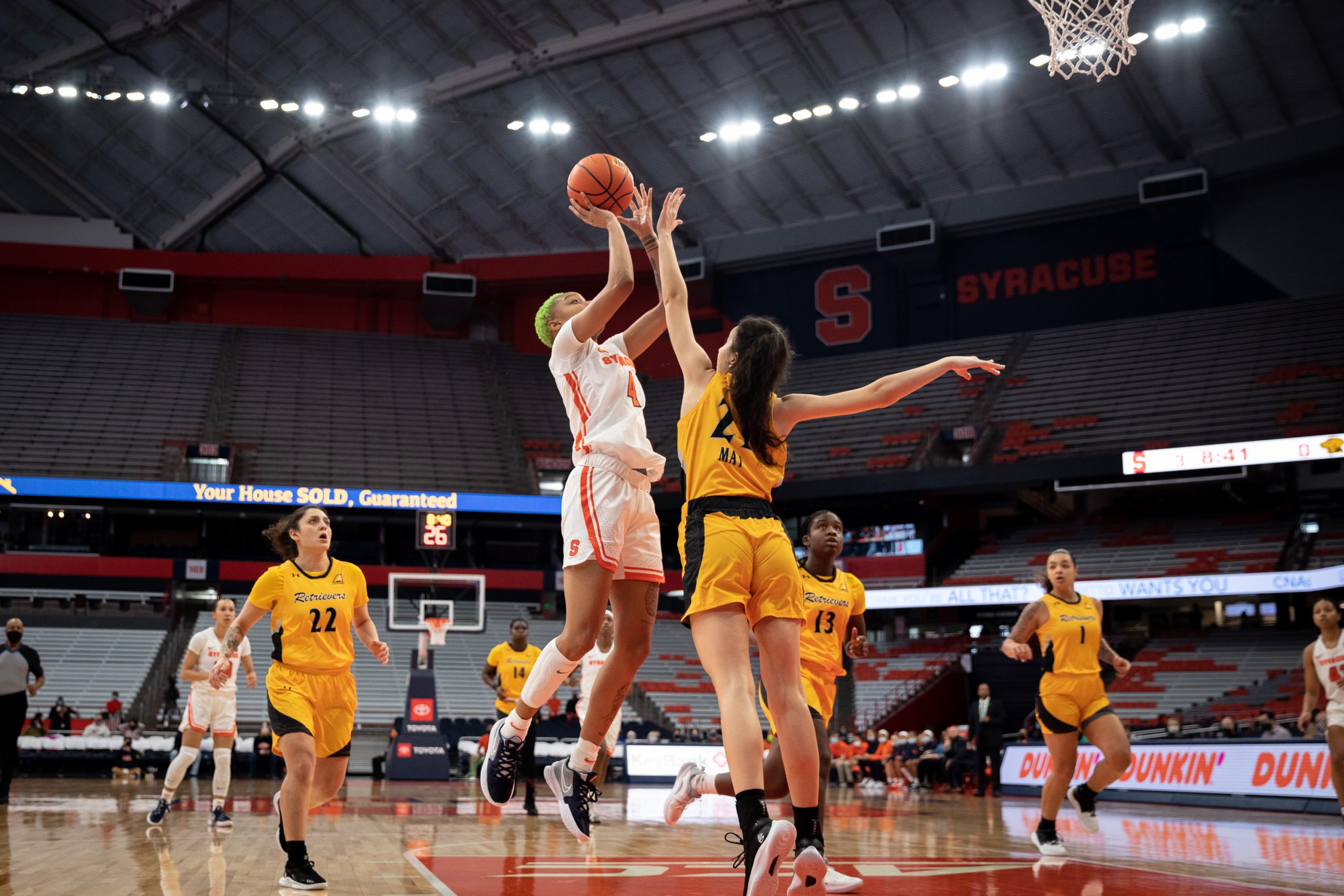 Alaysia Styles (4) rises above a UMBC defender in SU's win Saturday afternoon at The Dome.