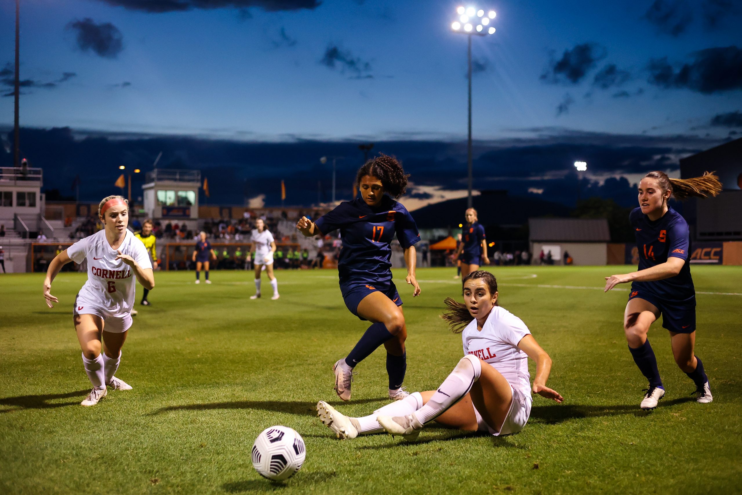 [Left to Right] Cornell's Ashley Durik, Syracuse's Kylen Grant, Cornell's Evanthia Spyredes and Syracuse's Kate Murphy chase the ball after it was blocked by Spyredes during a Women's Soccer game at SU Soccer Stadium on September 9, 2021.
