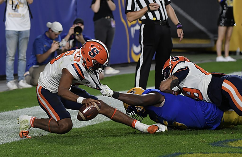 PITTSBURGH, PA - NOVEMBER 05: Carlos Del Rio-Wilson #16 of the Syracuse Orange is sacked in the end zone for a safety by Deslin Alexandre #5 of the Pittsburgh Panthers in the fourth quarter during the game at Acrisure Stadium on November 5, 2022 in Pittsburgh, Pennsylvania. (Photo by Justin Berl/Getty Images)