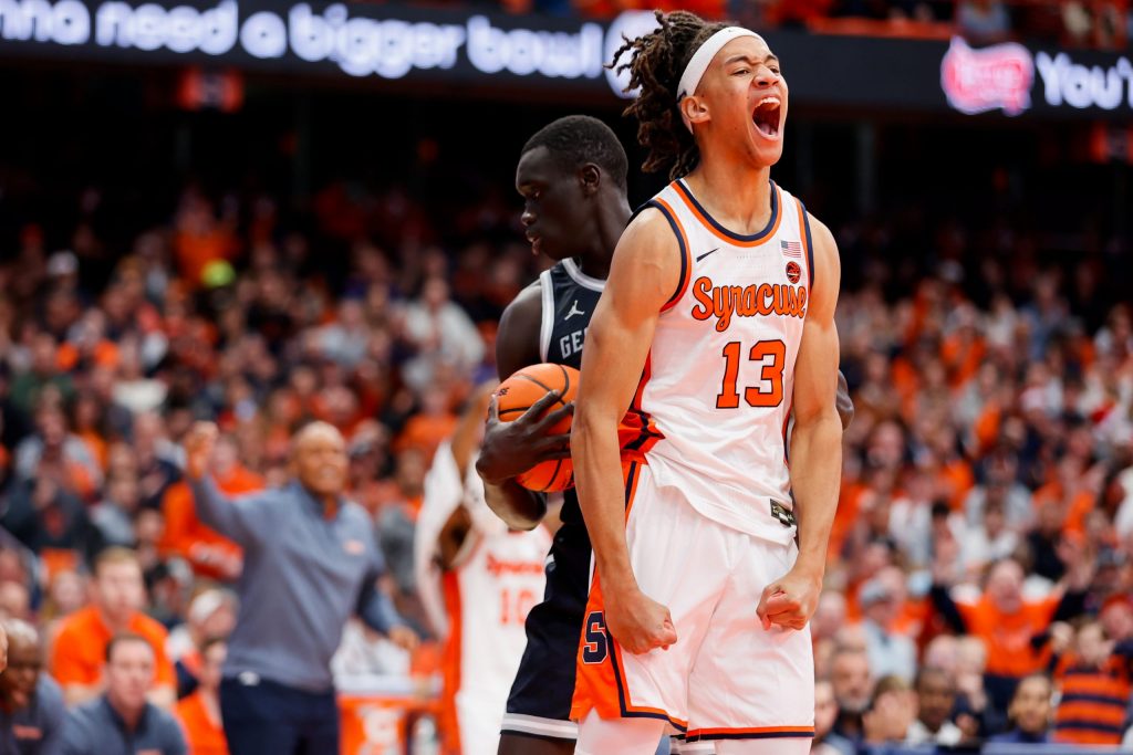 Benny Williams #13 of the Syracuse Orange reacts after a play against the Georgetown Hoyas at JMA Wireless Dome on December 10, 2022 in Syracuse, New York.