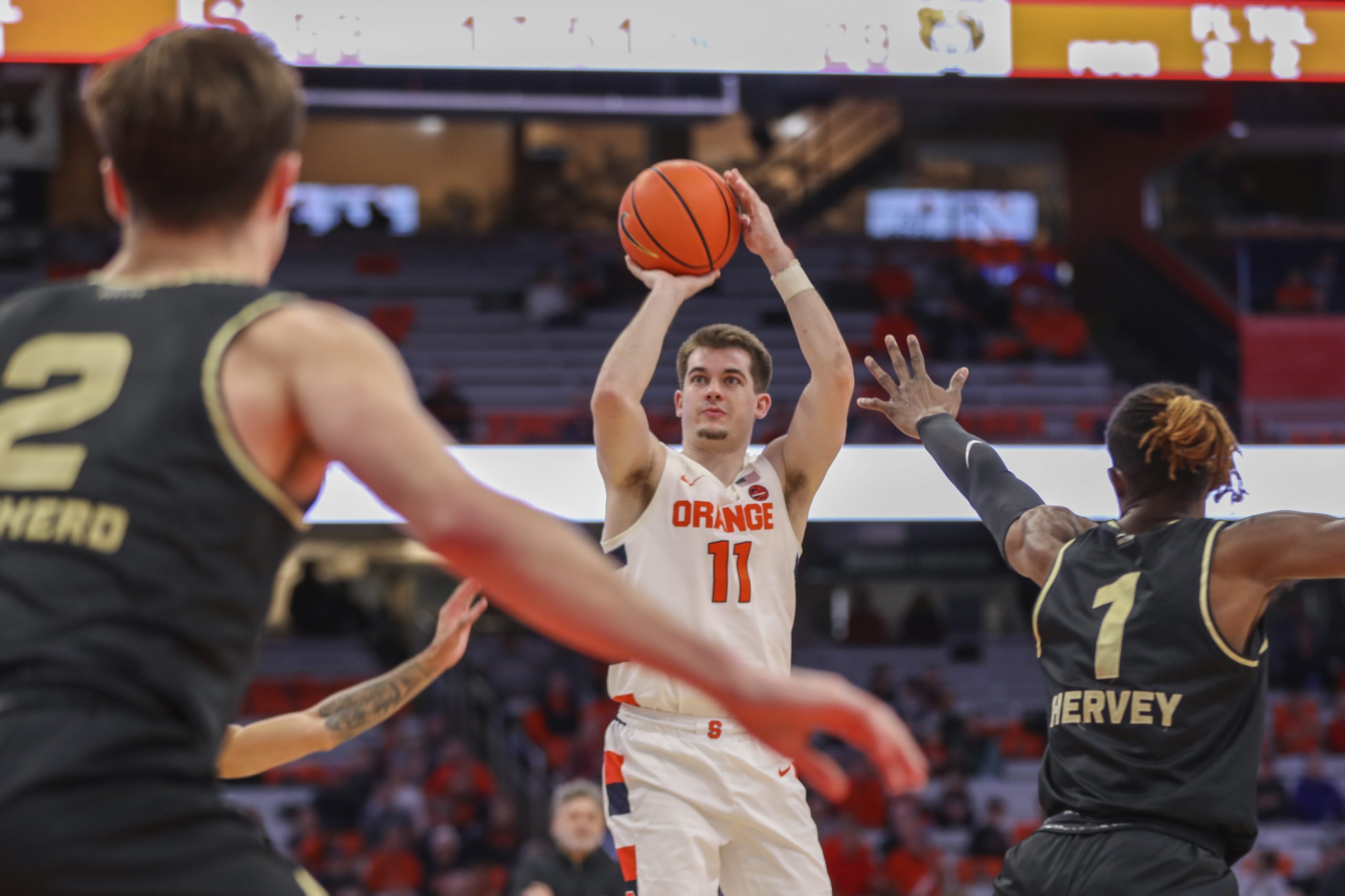 Joe Girard (#11) shooting a 3-pointer. 12-06-22. Taken by Charlotte Little.