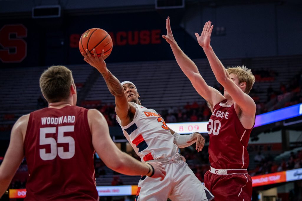 Syracuse's Judah Mintz (3) acrobatically attempts a layup in his team's loss on November 15, 2022.