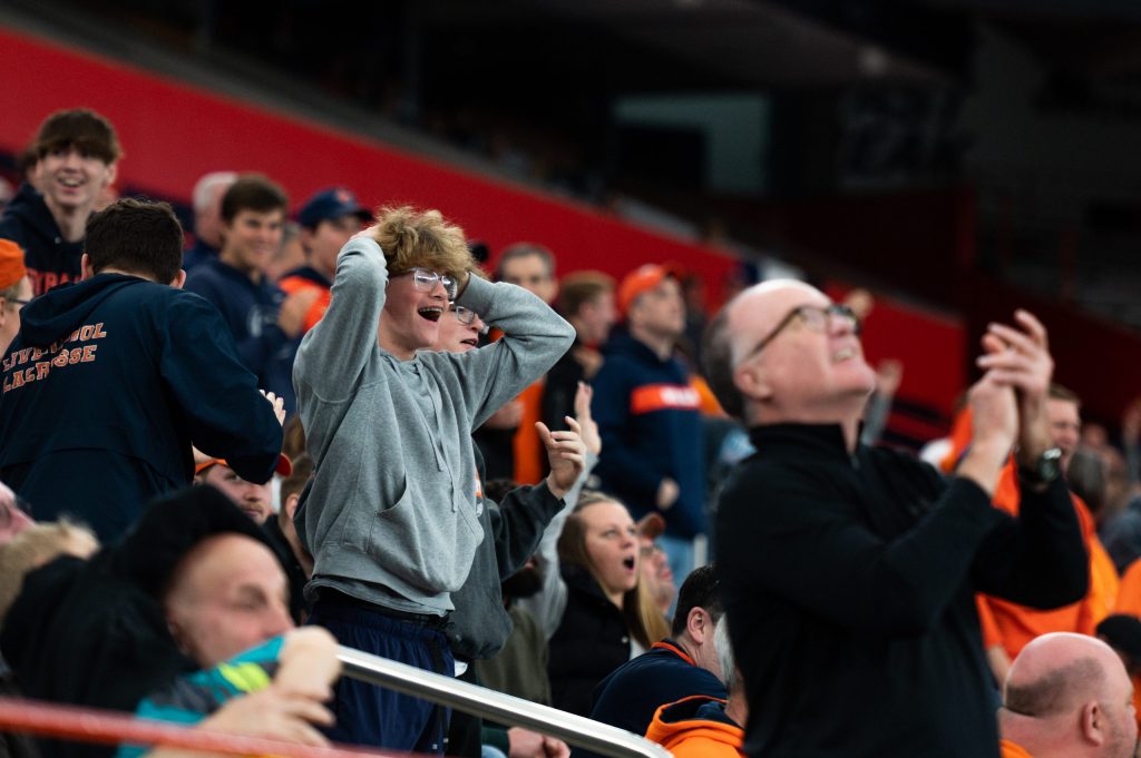 Syracuse fans react to a moment in SU's men'as lacrosse victory over Duke on March 26th, 2022.