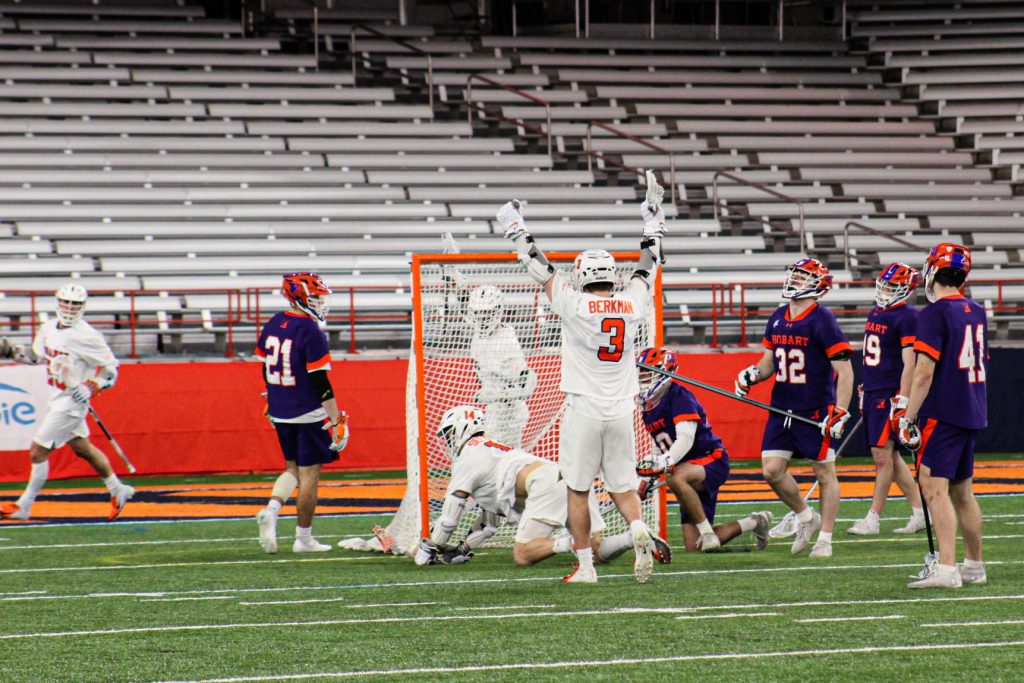 Syracuse Men's Lacrosse team celebrates a goal against Hobart on March 6th, 2022 at The Dome.