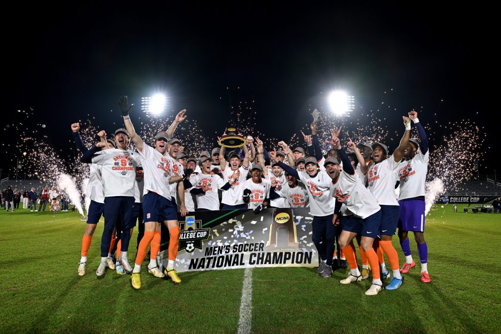 CARY, NORTH CAROLINA - DECEMBER 12: The Syracuse Orange celebrate after their win against the Indiana Hoosiers during the Division I Men’s Soccer Championship on December 12, 2022 at WakeMed Soccer Park in Cary, North Carolina. (Photo by Grant Halverson/NCAA Photos via Getty Images)