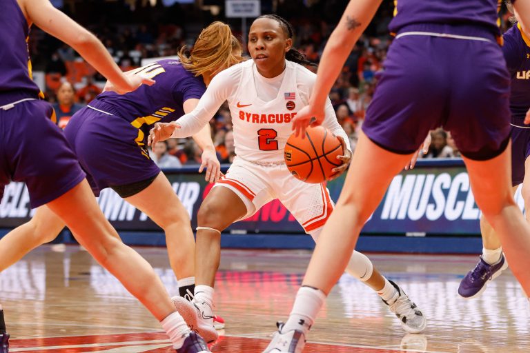 Syracuse's Dyaisha Fair (2) looks for a way to the basket through Albany's heavy defense during a women's basketball game on Tuesday, December 20, 2022, at JMA Wireless Dome.