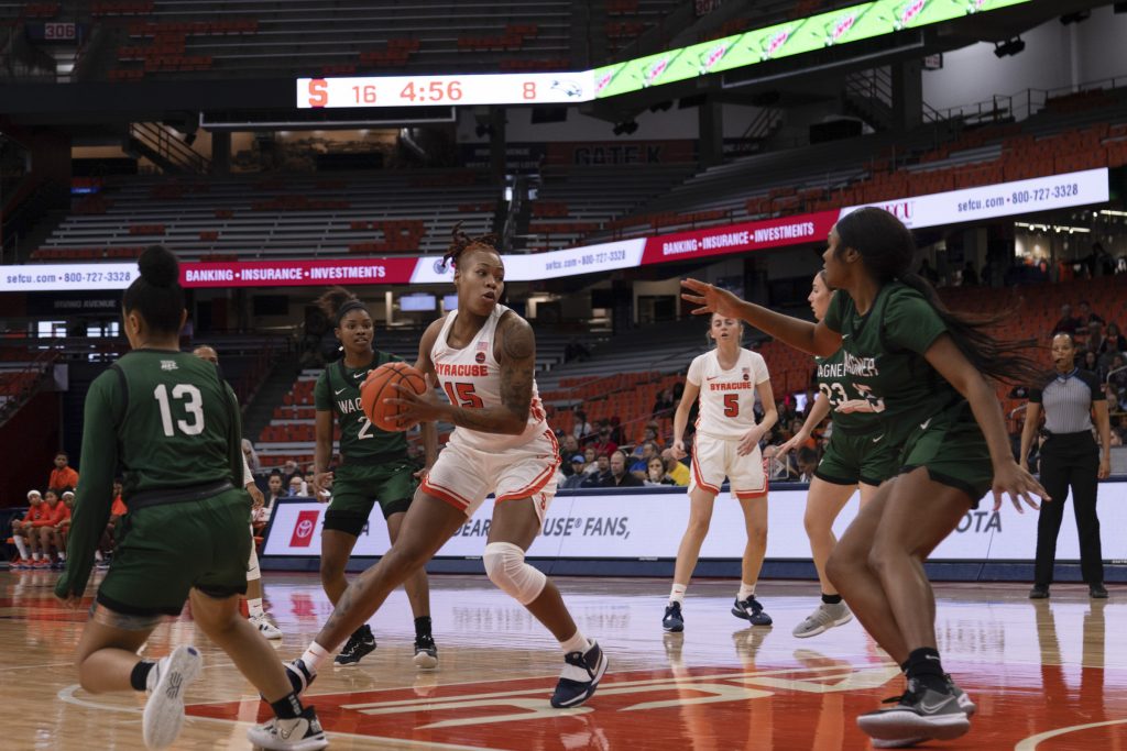 Syracuse's Asia Strong drives to the basket versus Wagner on December 11, 2022.