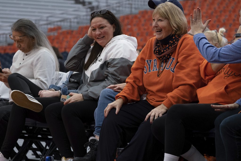 Syracuse fans sitting courtside react to their team's win over Wake Forrest on Sunday at The JMA Wireless Dome on December 19th, 2022.