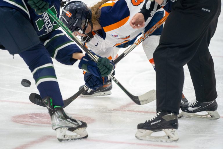 Syracuse's Lauren Bellefontaine wins a faceoff in the offensive zone.