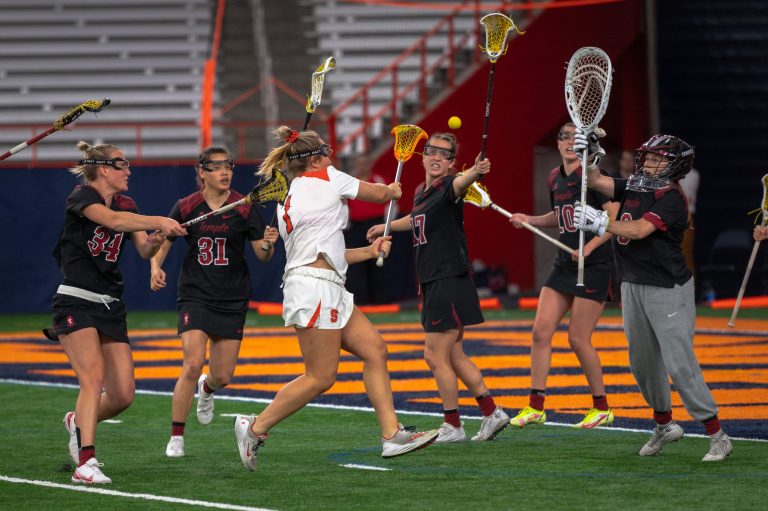 Olivia Adamson (No. 1) shoots on goal during Syracuse women's lacrosse win over Temple on March 26, 2022