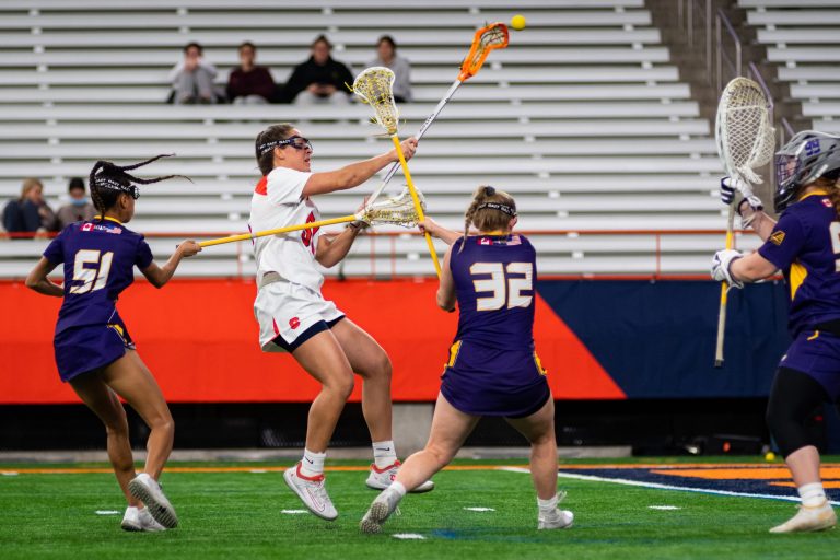 Emily Hawryschuk (51) makes her school-record-setting goal against UAlbany during the Women's Lacrosse game in the Dome at Syracuse University at Syracuse, New York on April 19, 2022.