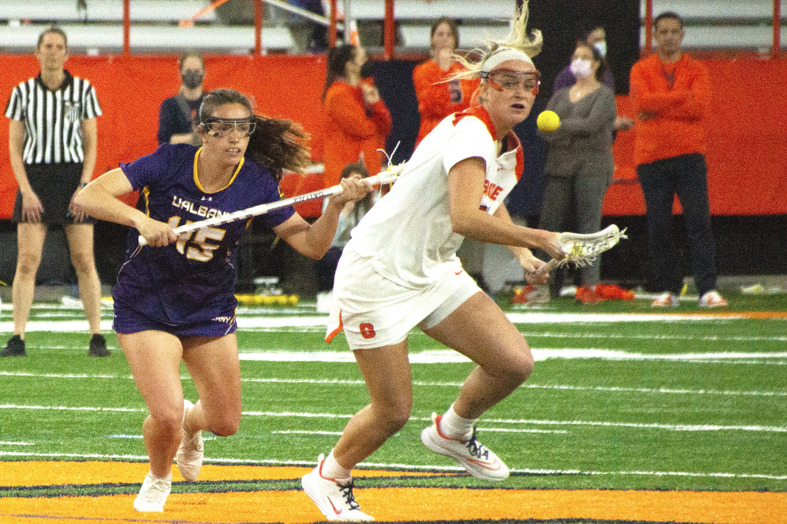 Number 8# takes off against UAlbany during the Women's Lacrosse game in the Dome at Syracuse University at Syrause, New York on April 19, 2022. (Photo by Nicole Funes)