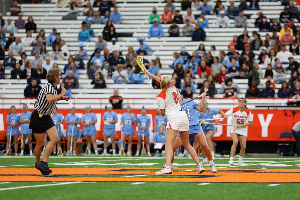 A face-off during Syracuse vs. North Carolina women's lacrosse game on April 9, 2022, in the Carrier Dome.