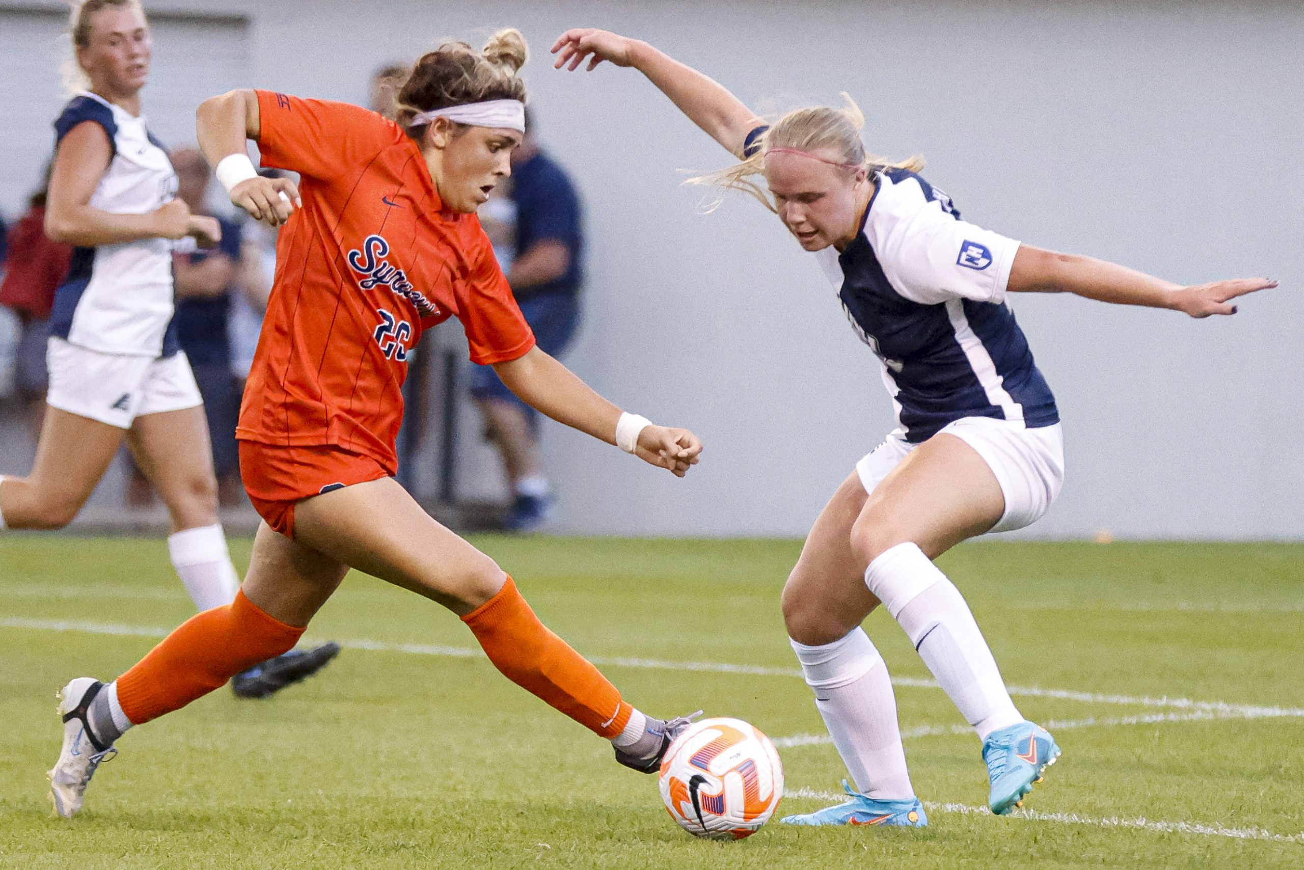 Syracuse's Erin Fleury, left, attempts to move around New Hampshire's Delaney Diltz during a non-conference women's soccer game on Thursday at SU Soccer Stadium.
