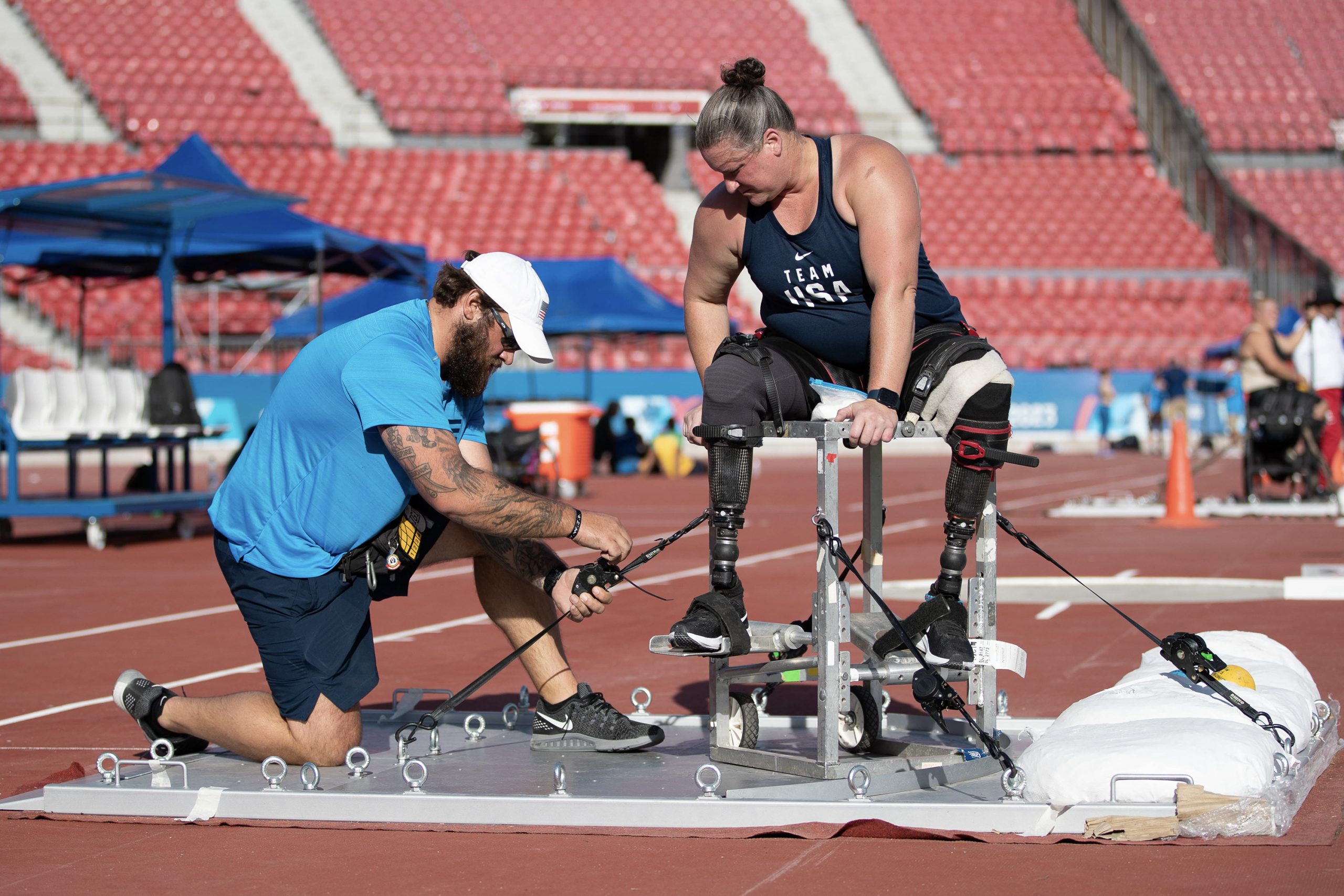 Christy Gardner straps into her seat while training at the 2023 Parapan American Games in Santiago, Chile.