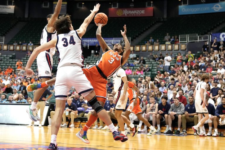 Judah Mintz #3 of the Syracuse Orange takes a shot over Braden Huff #34 of the Gonzaga Bulldogs in the first half during a college basketball game on day two of the Allstate Maui Invitational at the SimpliFi Arena at Stan Sheriff Center on November 21, 2023 in Honolulu, Hawaii.