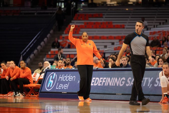 Syracuse Head Coach Felisha Legette-Jack calls a play adjustment from the coach's box, Thursday November 30.