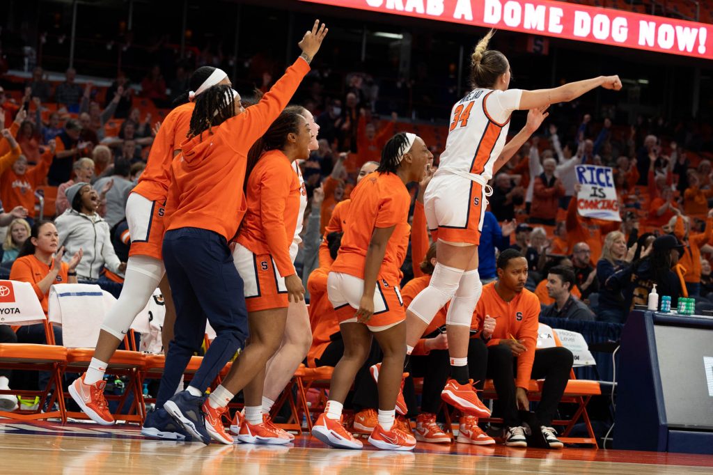 The Syracuse bench erupts after a clutch foul is drawn on Thursday night.