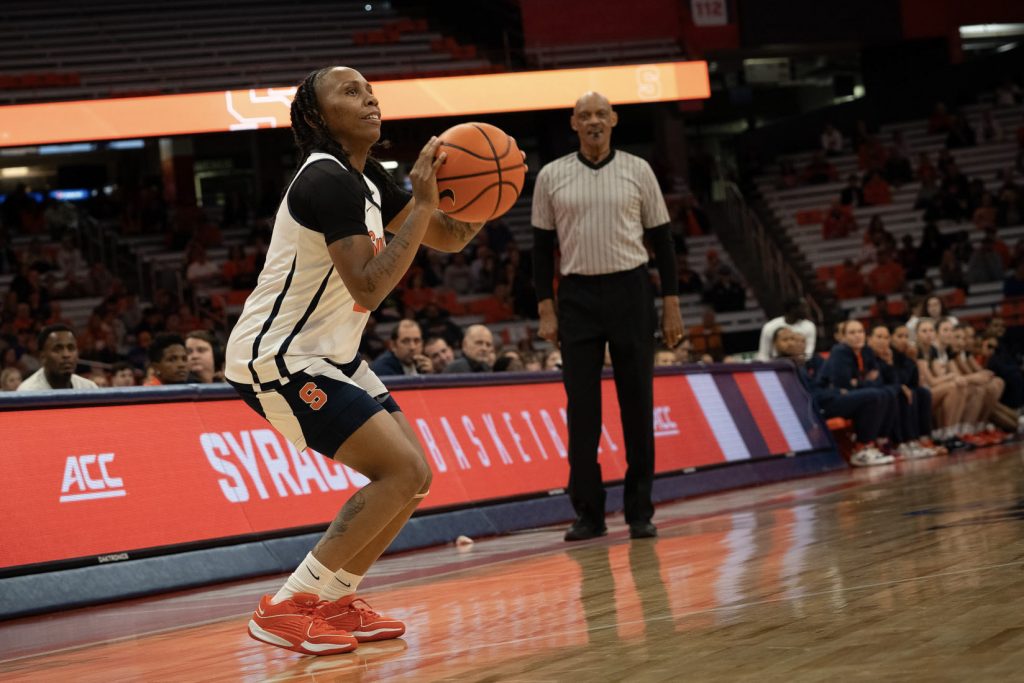 Dyaisha Fair takes a corner three at the start of the scrimmage during the Orange Tipoff event at the JMA Wireless Dome on Oct. 13, 2023.