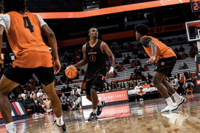 JJ Starling bringing the ball up the court during the Orange Tipoff event at the JMA Wireless Dome on Oct. 13, 2023.