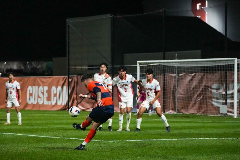 Mateo Leveque (#7) takes a free kick following a foul against Felipe D'Agostini (#11). Leveque had two assists on Thursday night, contributing to the 3-1 comeback win against Boston University.